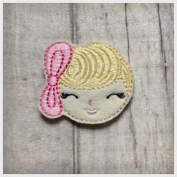 Girl with pink bow feltie