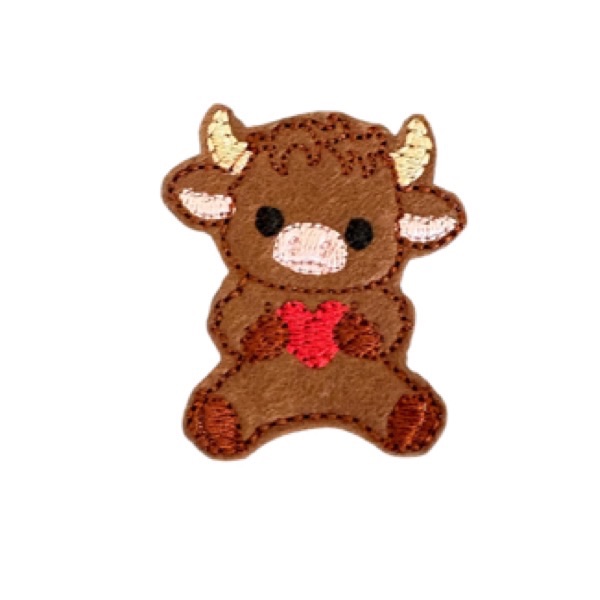 Highland cow with heart feltie