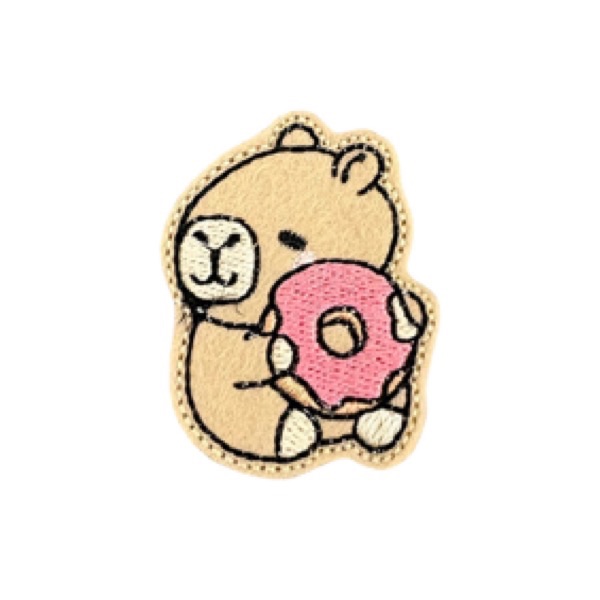 Capybara eating doughnut feltie