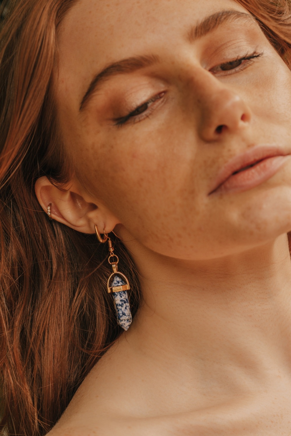 Gold Tone Blue Vein Stone Crystal Point Earrings