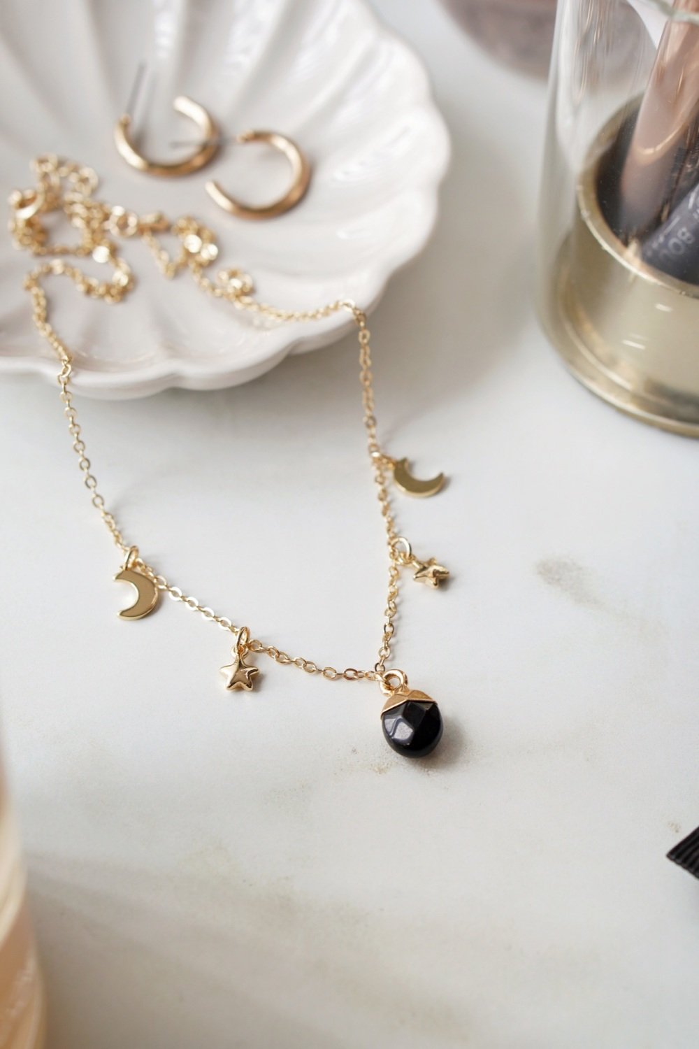 Gold Tone Black Obsidian Moon and Stars Charm Necklace