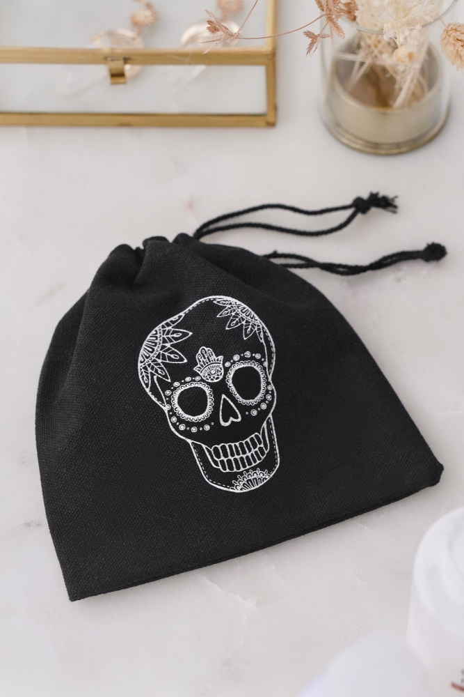 Tigers Eye Crystal Gua Sha with Black Skull Pouch