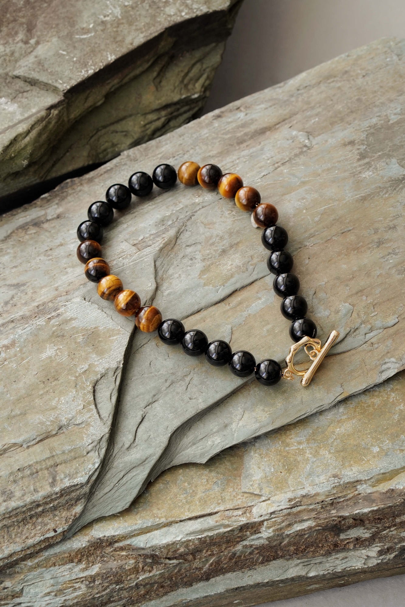 Mens Gold Tone Tigers Eye and Black Onyx Crystal Bracelet by Xander Kostroma