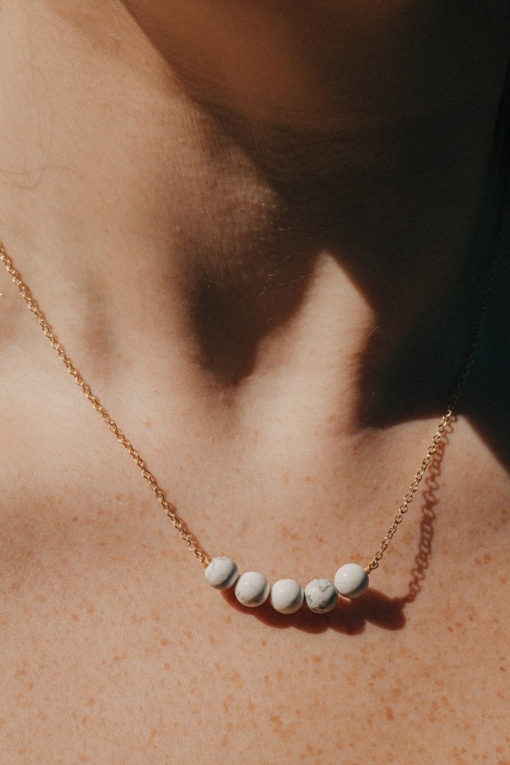 Gold Tone 5 Howlite Crystal Ball Necklace