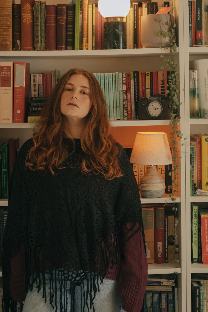 Black Knitted Poncho with Tassels