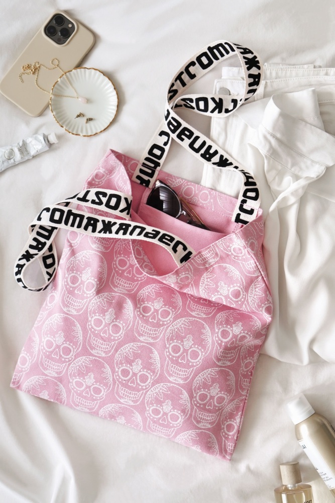 Pink Skull Tote Bag by Xander Kostroma