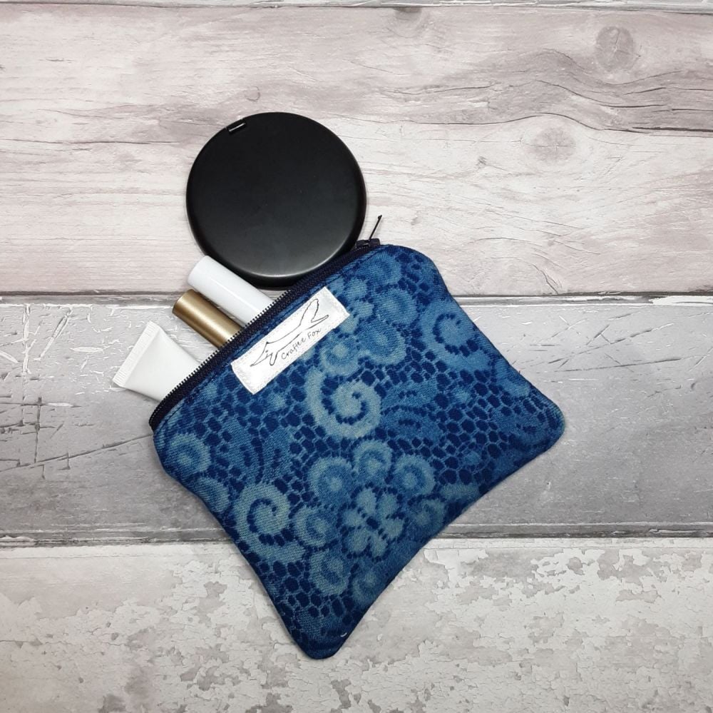 Lacey patterened pouch