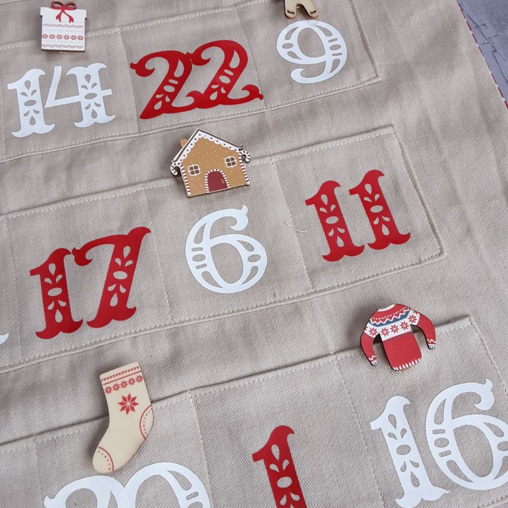 Organic fabric Advent Calendar with red and white numbers