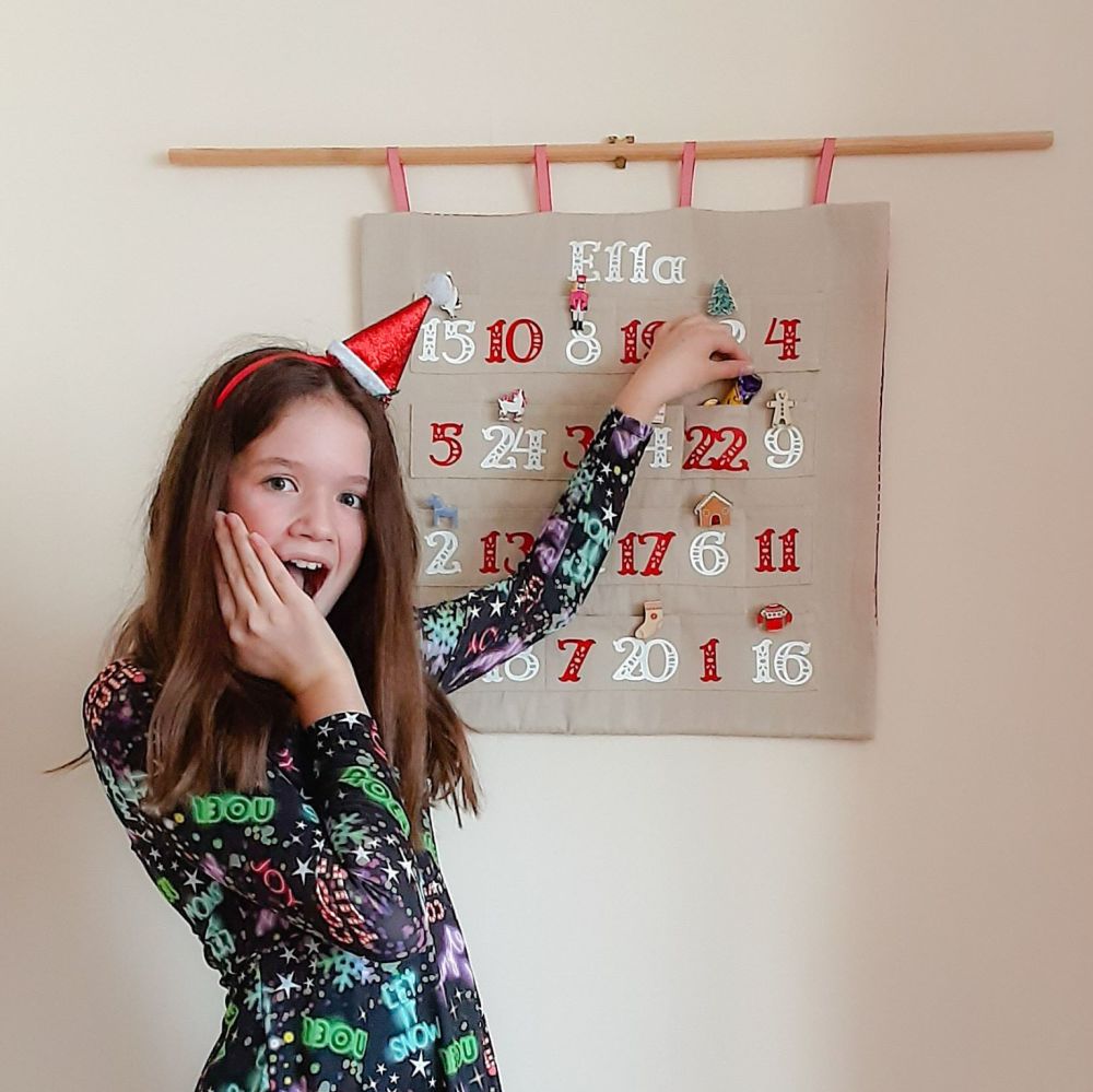 Organic fabric Advent Calendar with red and white numbers