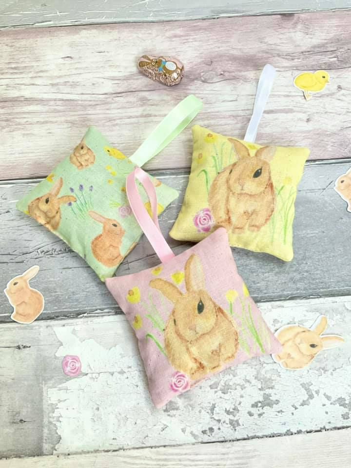 Hanging lavender sachet bags with bunny rabbits on in pink, yellow and green