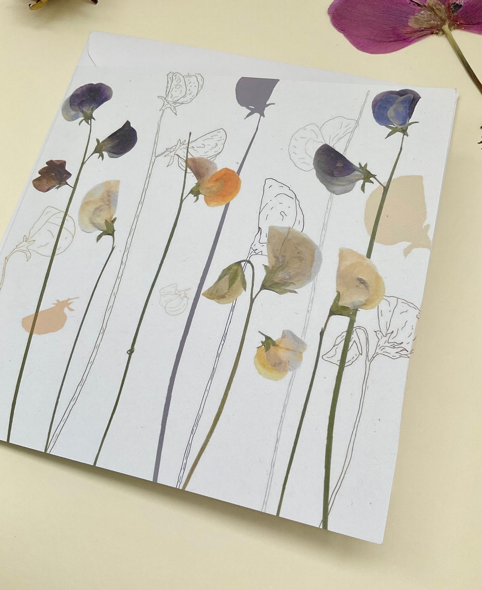 card featuring sweet peas, line drawings of sweet peas and silhouettes