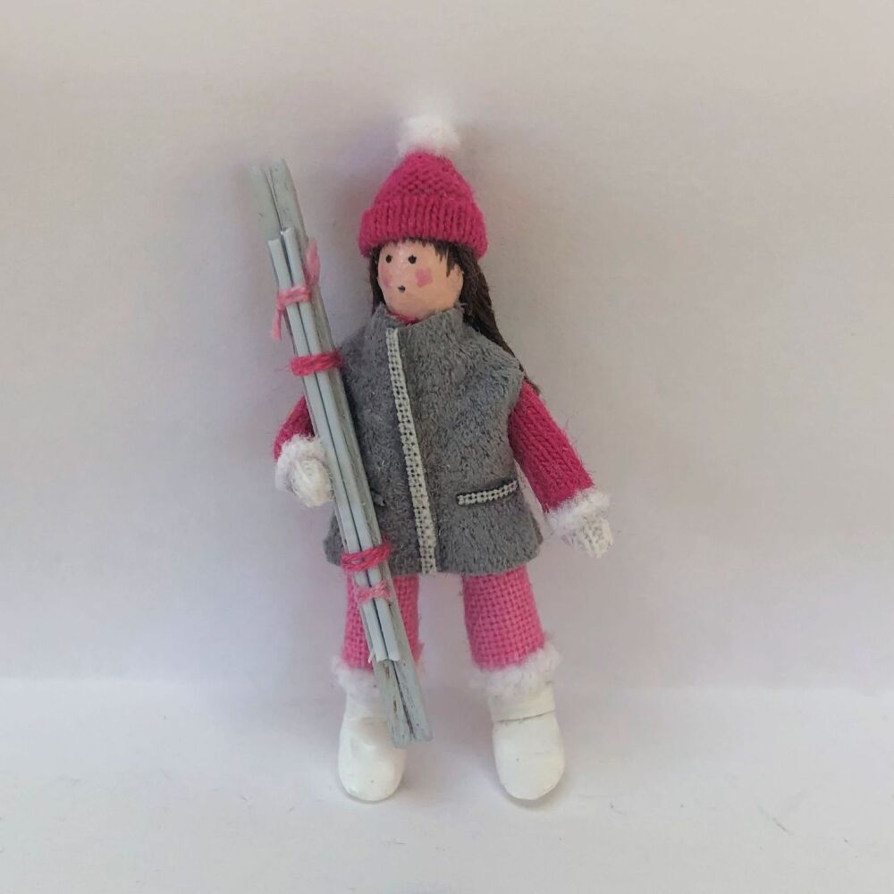 Woman Skier in Fuchsia Pink