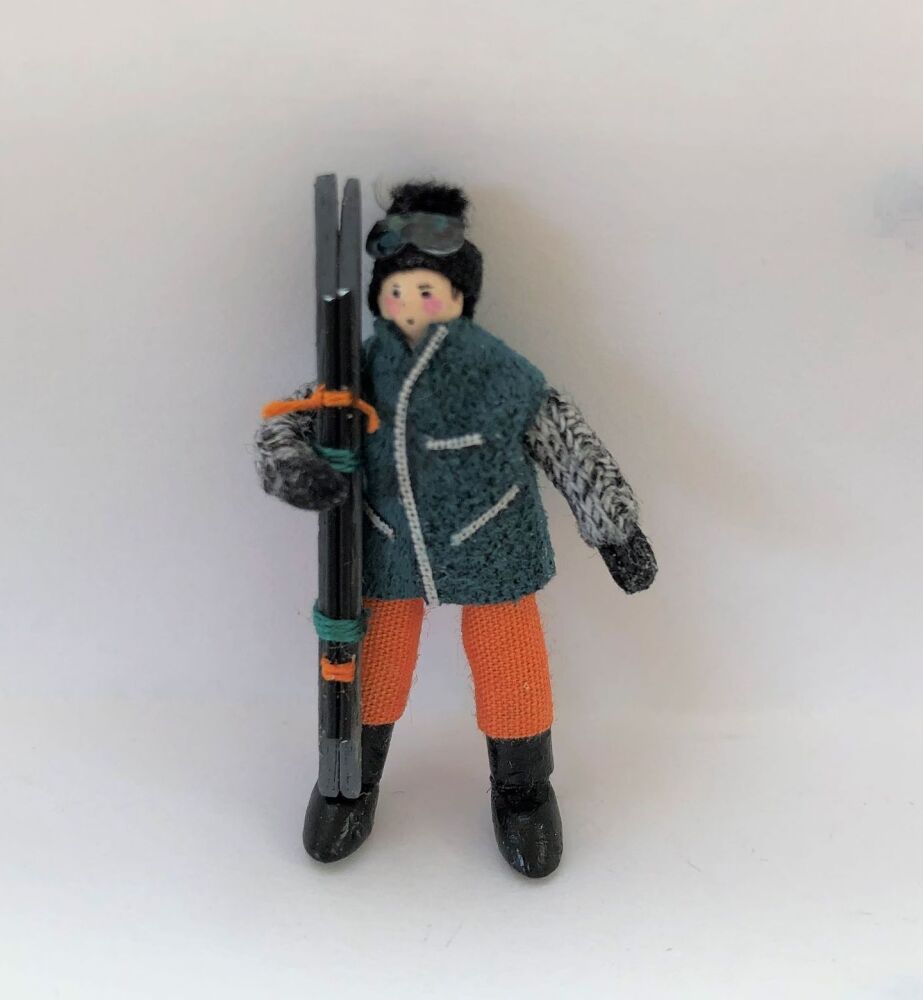 Male Skier green jacket