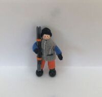 Boy Skier in grey jacket
