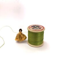 Dressed doll gold