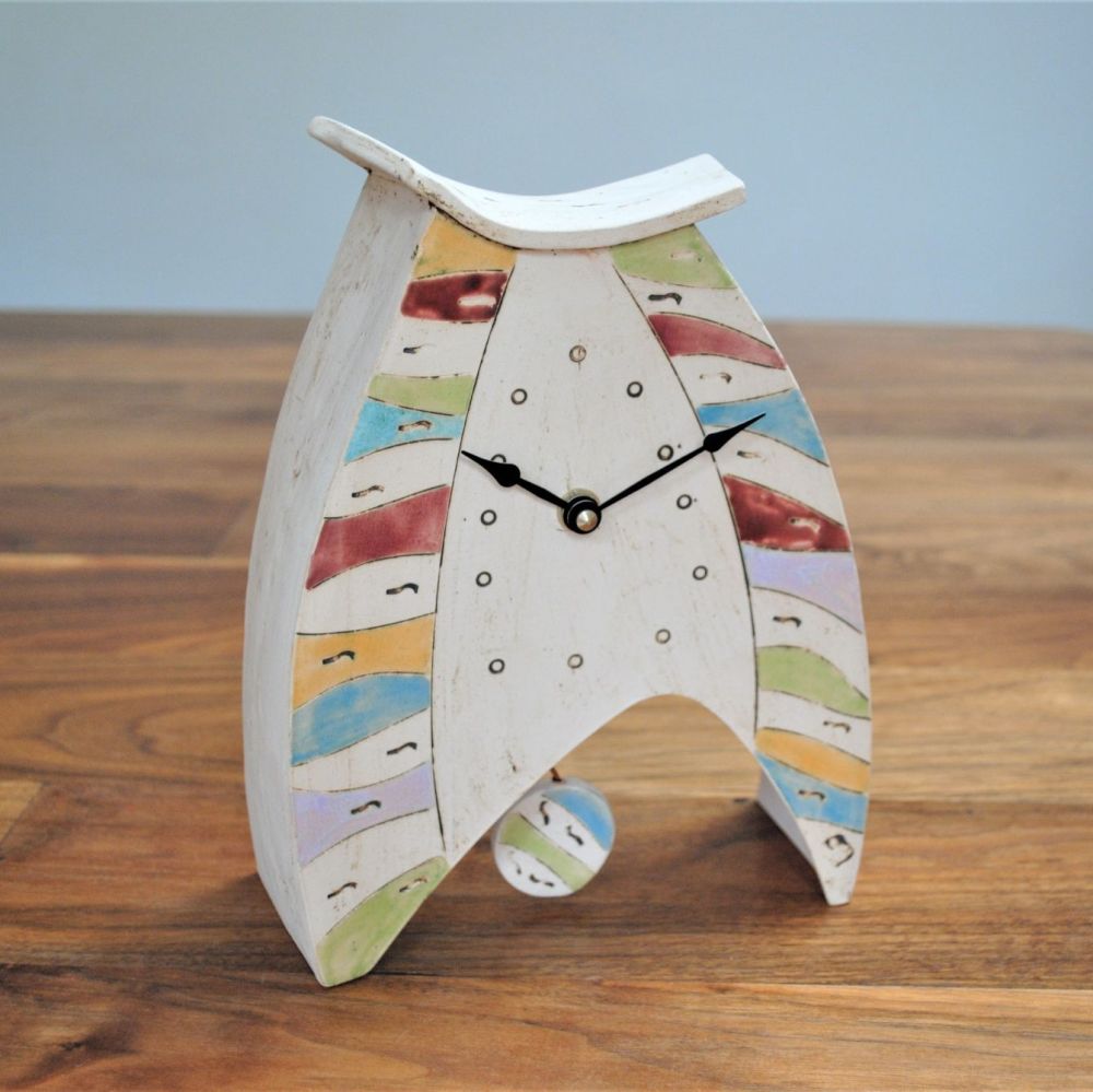 Handmade ceramic mantel clock with pendulum, made form white clay and decor