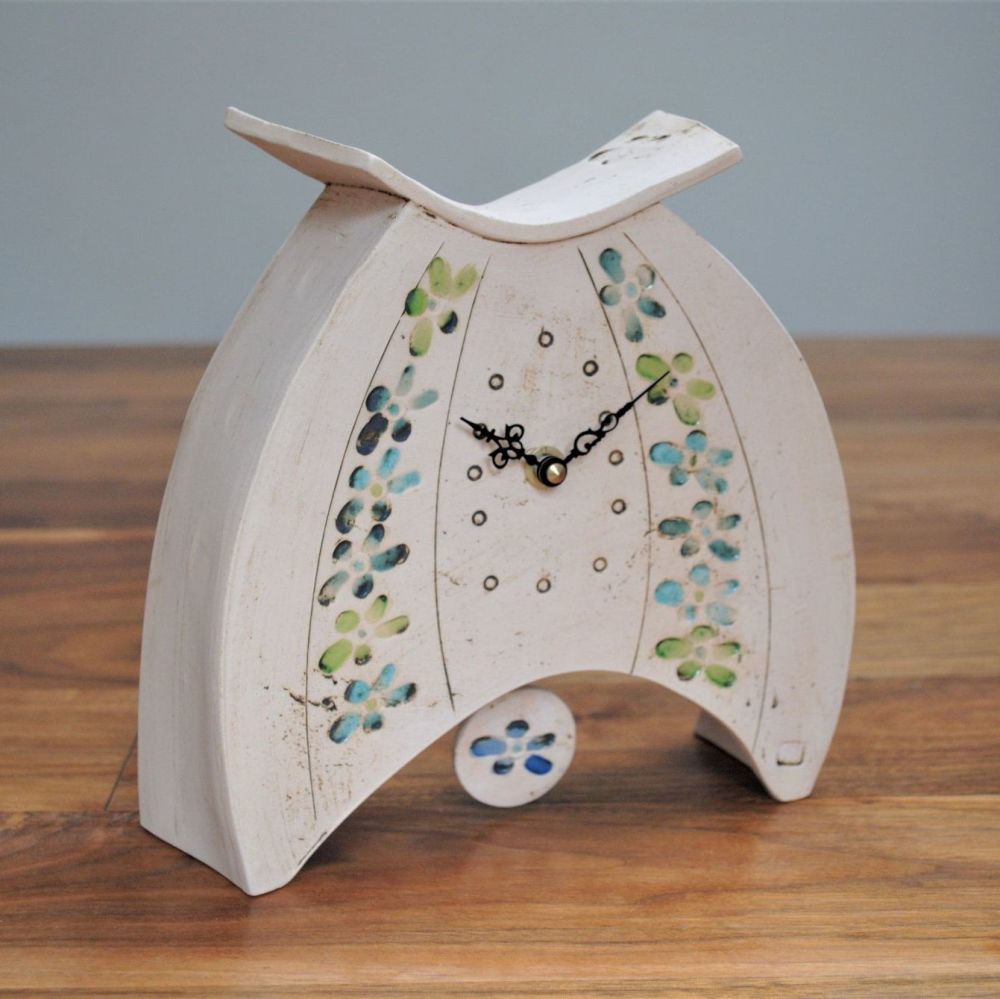 Handmade ceramic mantel clock  with pendulum, made from white clay and deco