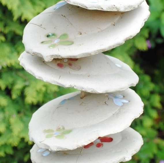 Handmade ceramic wind chime with colourful flowers prints, weatherproof. 
