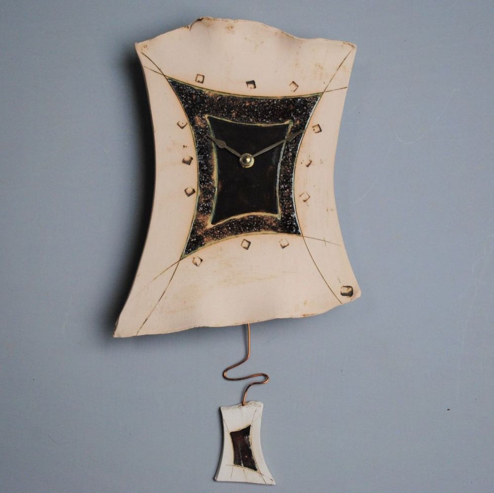 Handmade ceramic pendulum wall clock, contemporary desing, deep red and met