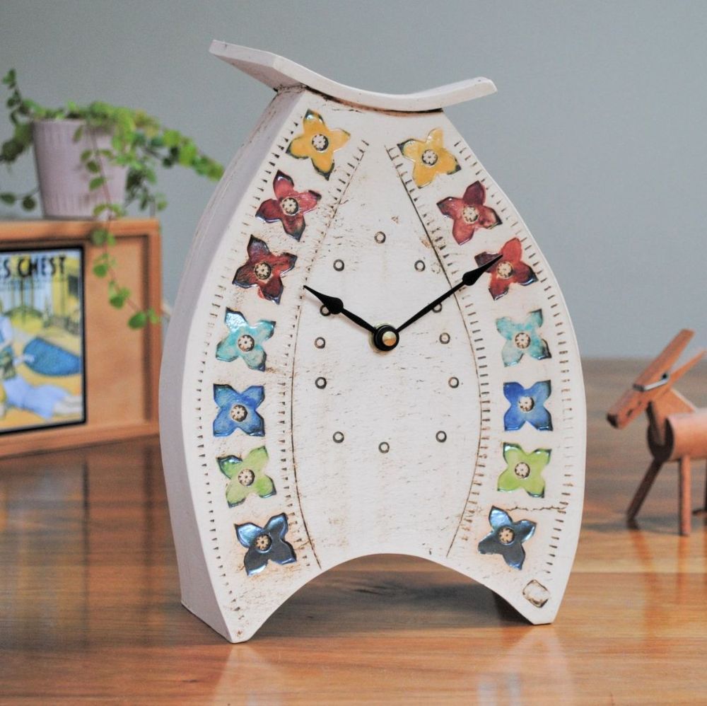 Large ceramic mantel clock made from white clay  with multicolour print 