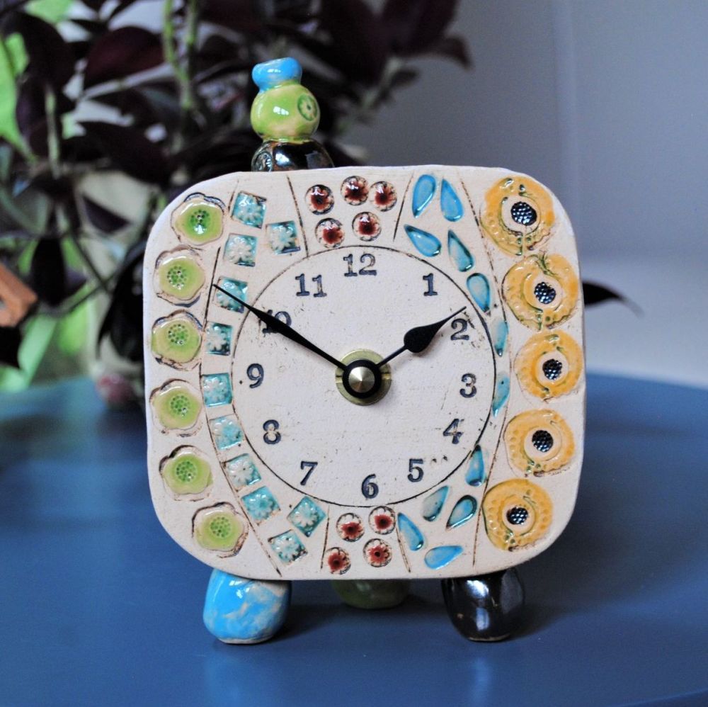 Handmade ceramic clock with bright colours