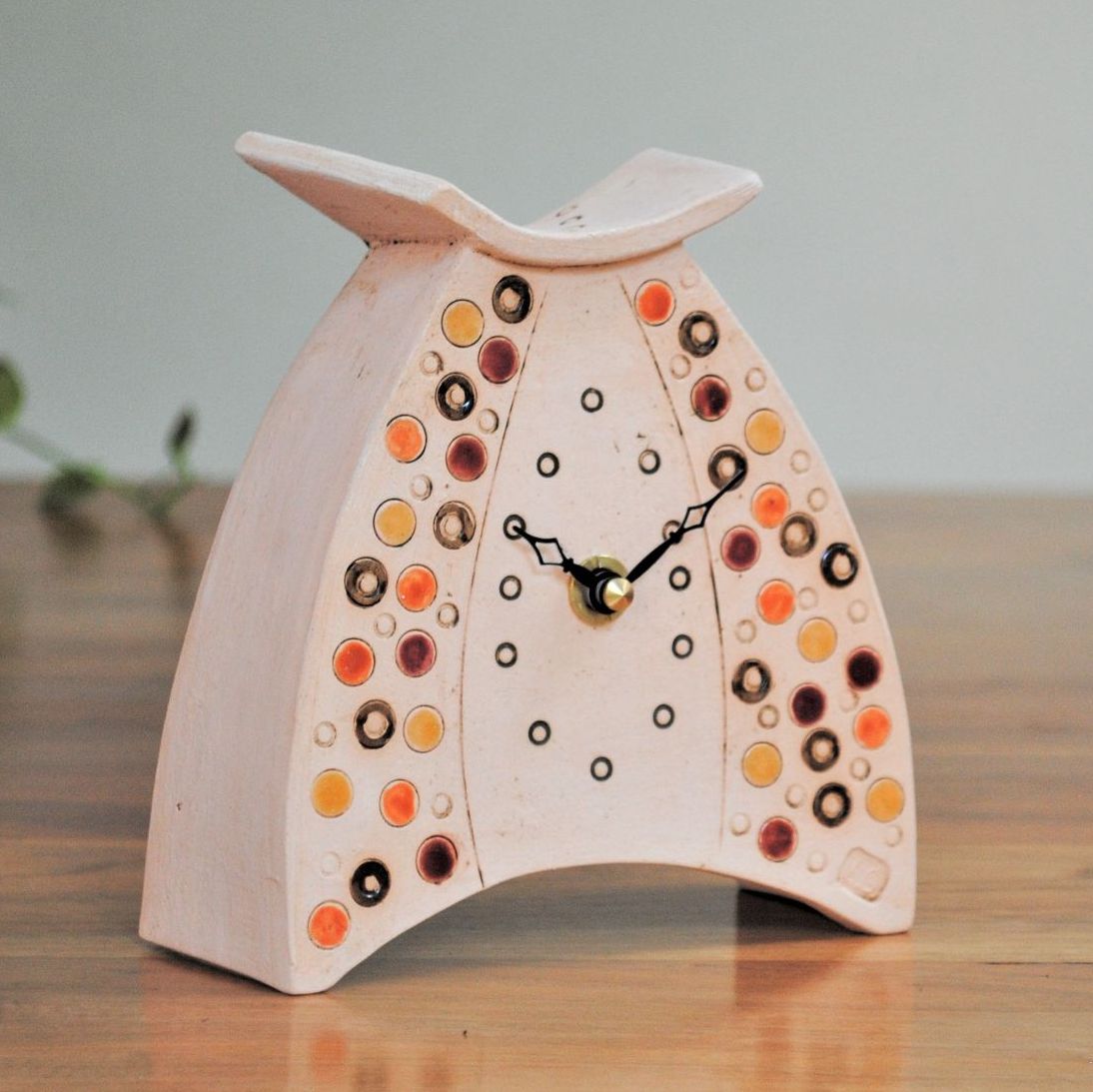 Small ceramic mantel clock handmade from off-white clay, orange,red, yellow