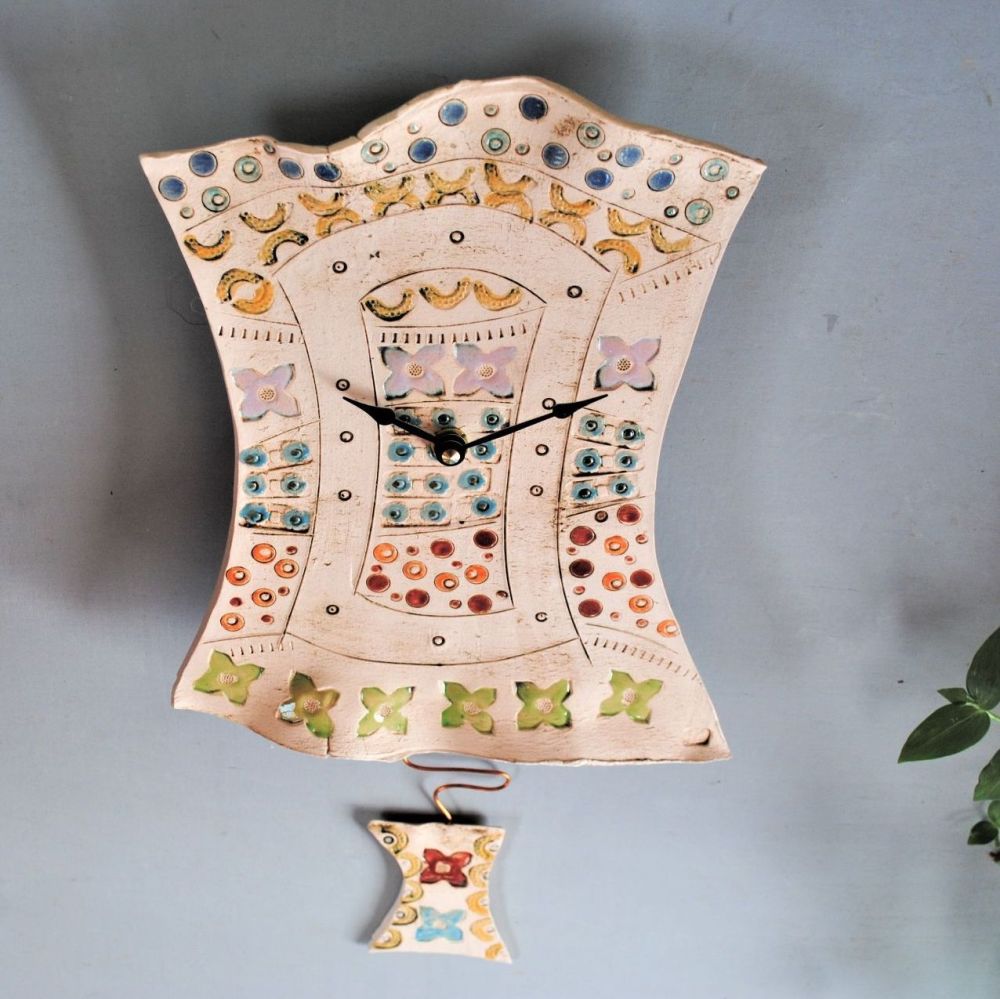 Ceramic pendulum wall clock "Happy rainbow colours"