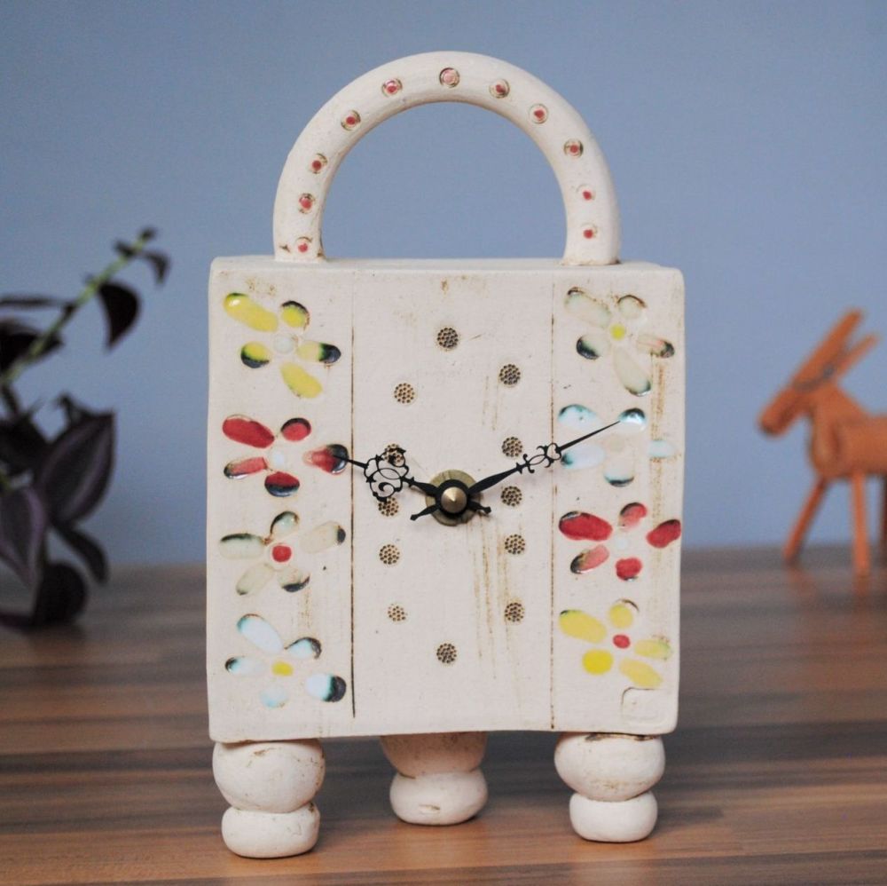 Handmade carriage clock with flowers and handel  