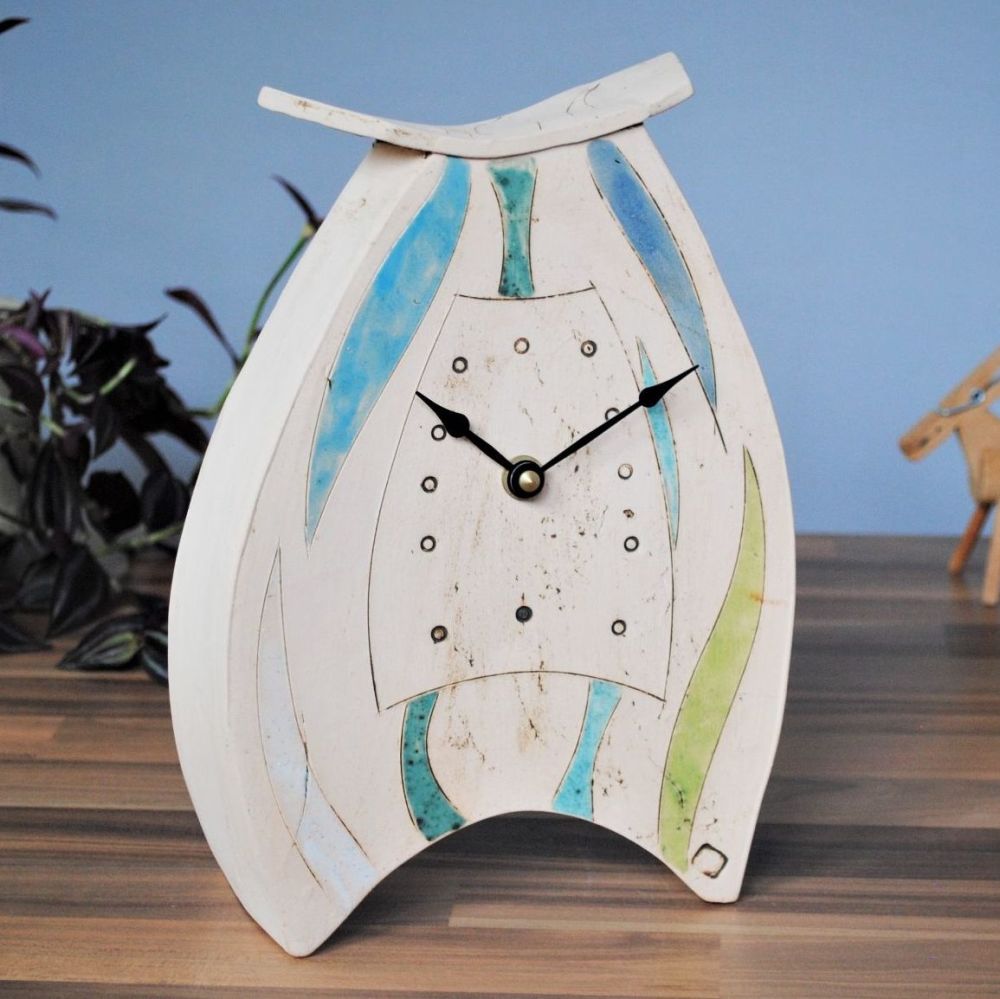 Handmade personalised mantel clock.
