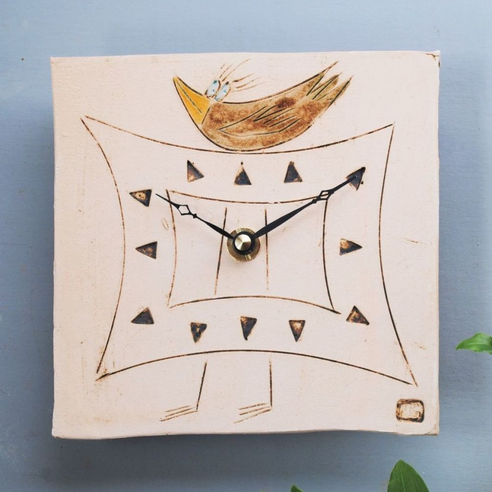 Ceramic wall clock square with bird.