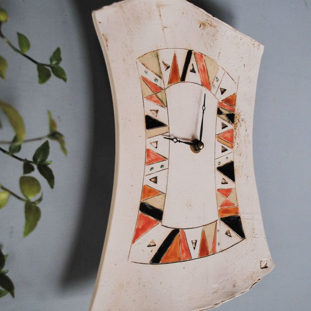 Ceramic pendulum wall clock "Geometrical pattern."