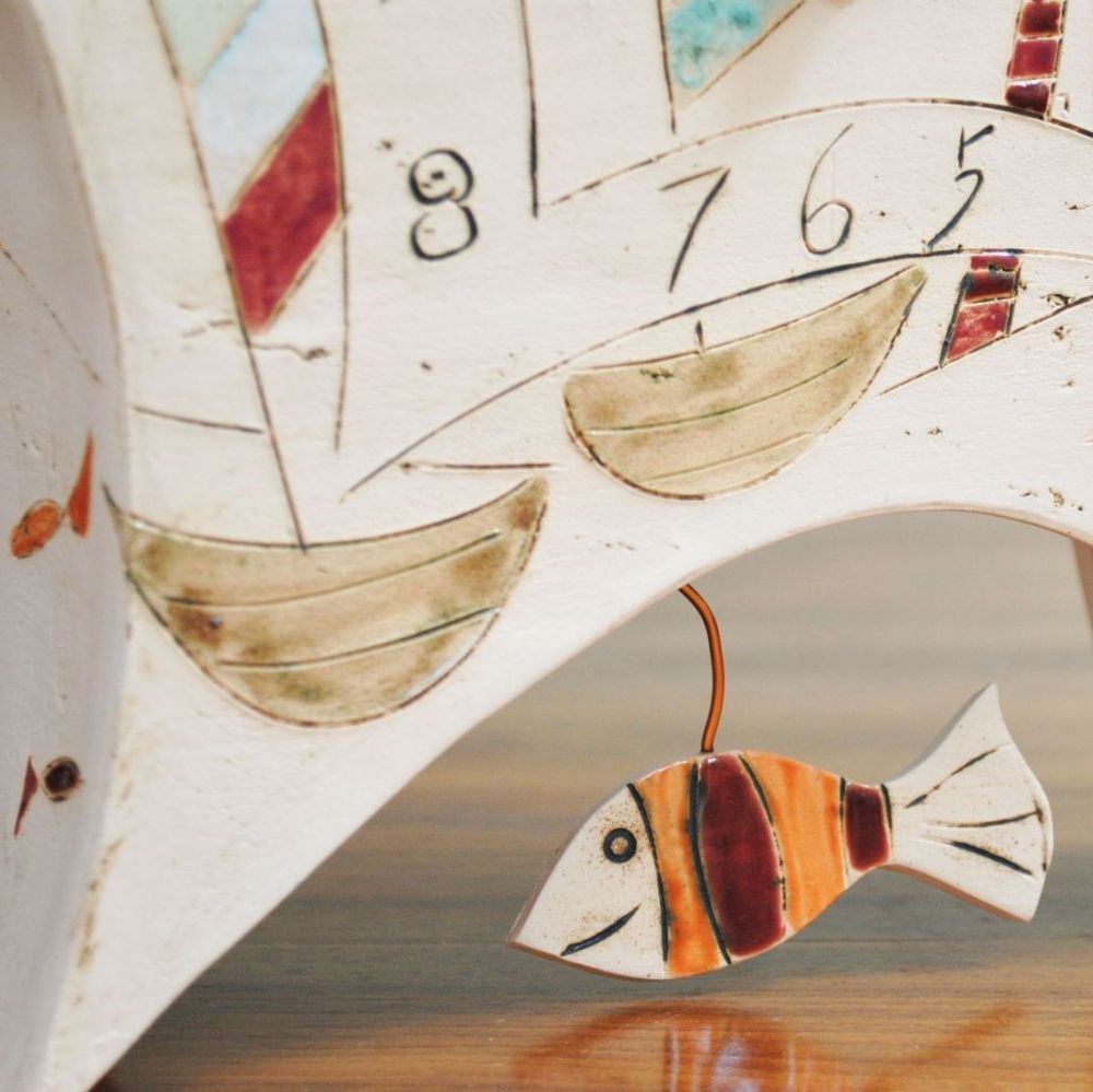 Ceramic mantel clock - Large with pendulum "Boats, huts, fish"