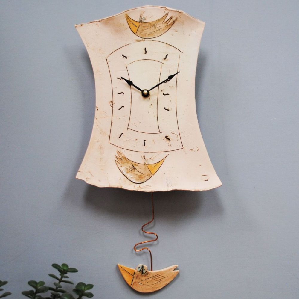 Ceramic pendulum wall clock "Bird"