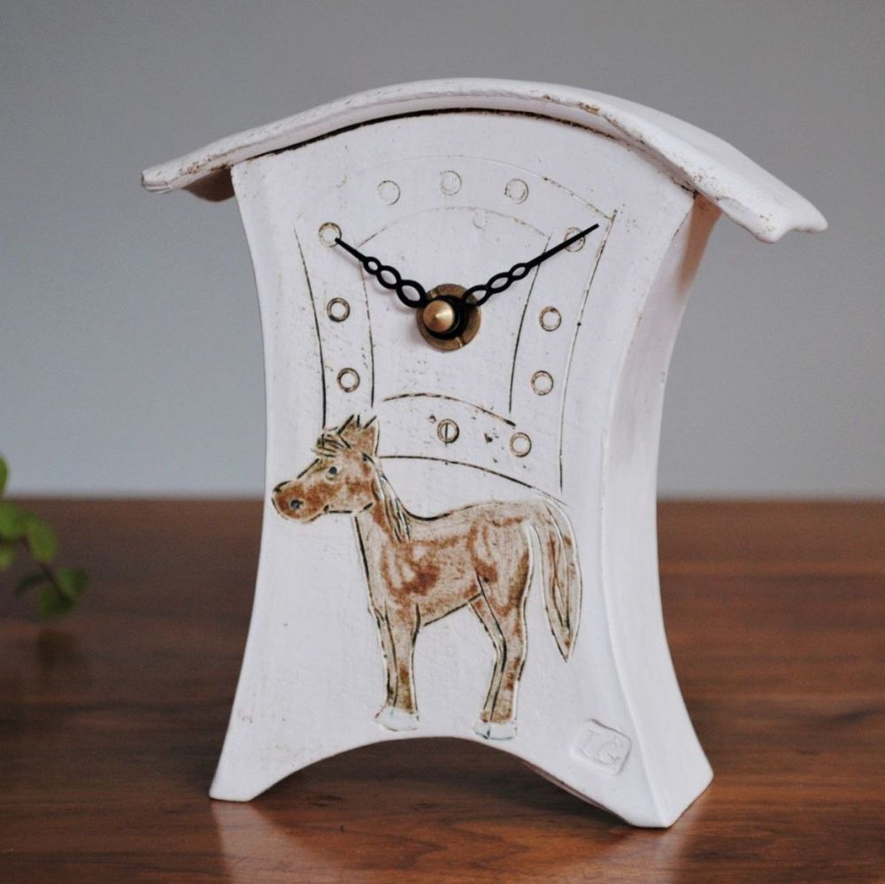 Ceramic mantel clock with brown horse