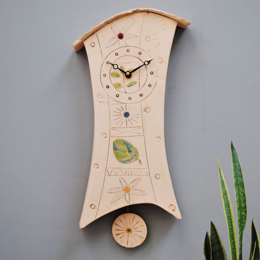 Original clock with flowers and leaves design.