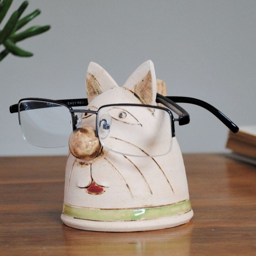 Handmade ceramic glasses holder cat design with green collar. 