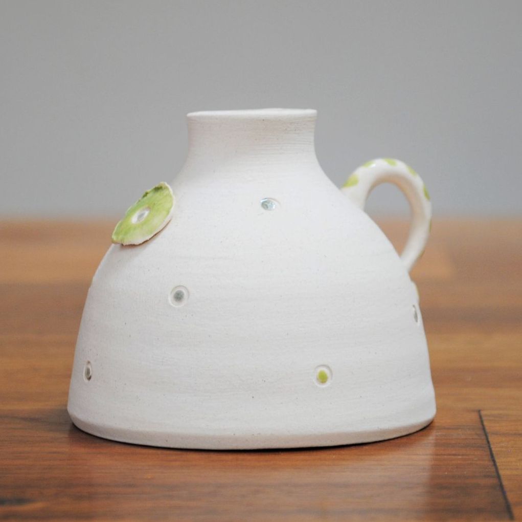. . . . . . was £19 . . . . . now £15 . . . . . . . .   Bud vase - White & lime green