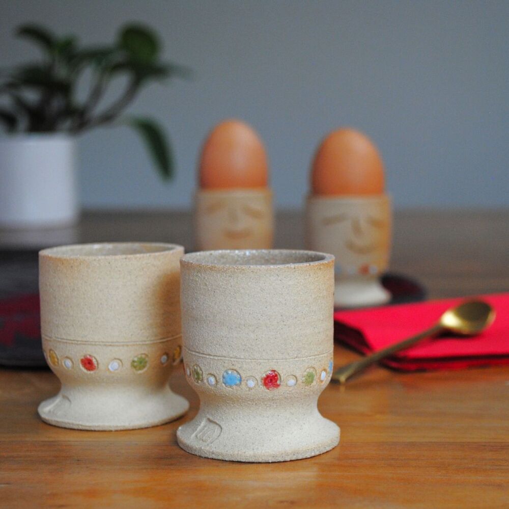 Egg cup smiley face & flowers