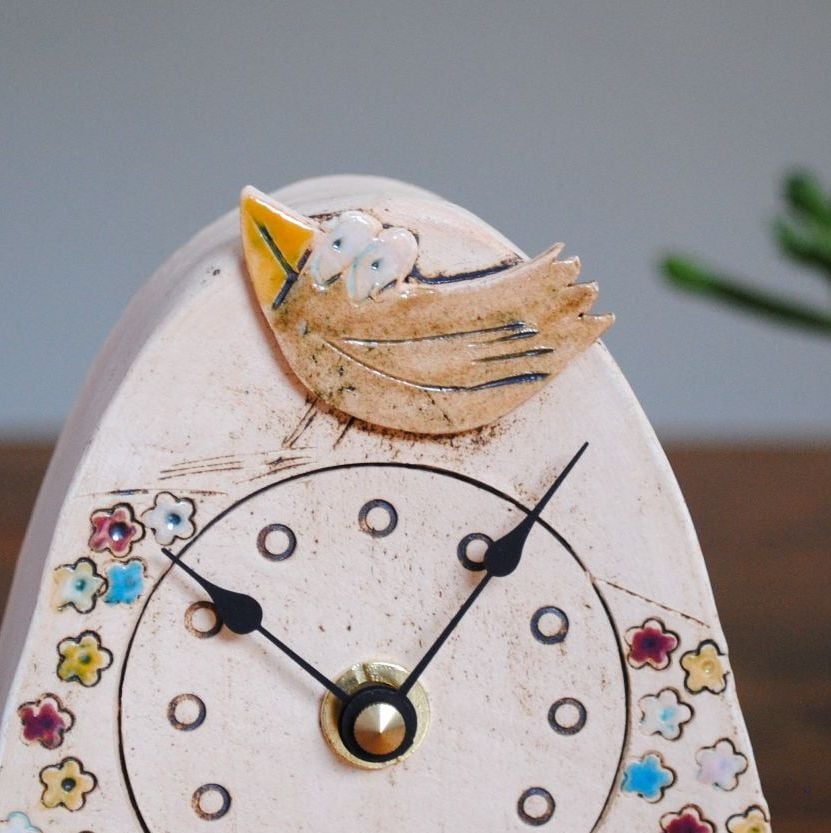 Ceramic mantel clock  small rounded "Brown bird & colourful meadow"