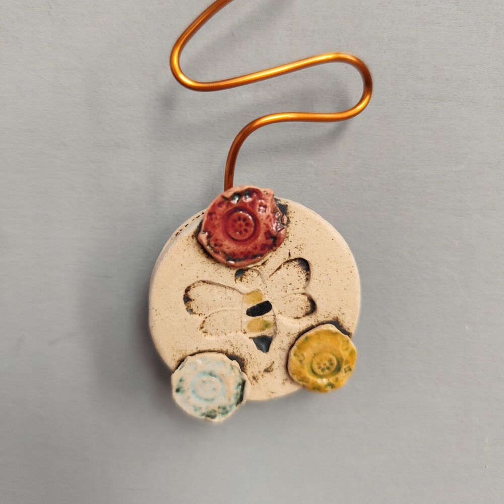 Ceramic pendulum wall clock - Small "Bumblebee"