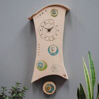 Ceramic wall clock with pendulum 