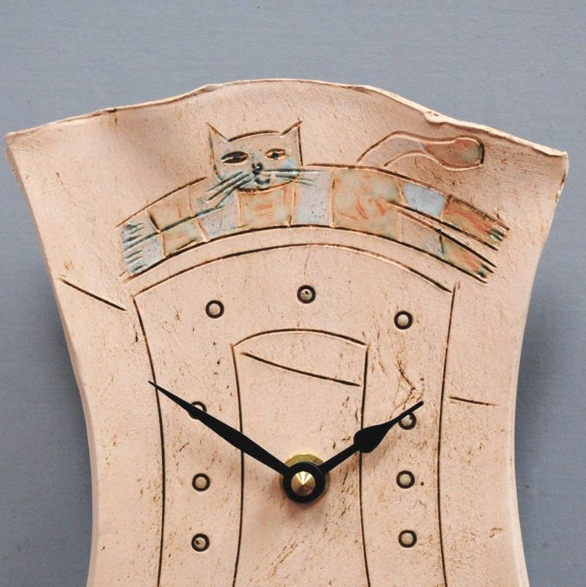 Ceramic pendulum wall clock small "Jumping brown dogs"