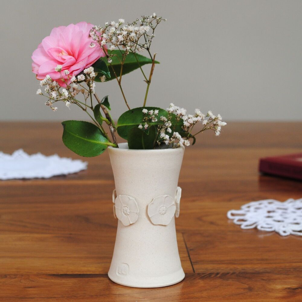 Handmade unique ceramic vase in white.
