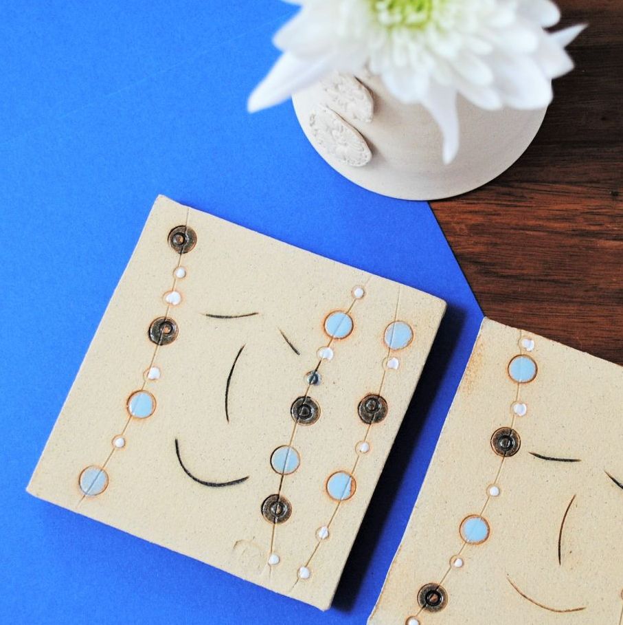 Coaster "Smiley face and blue dots"