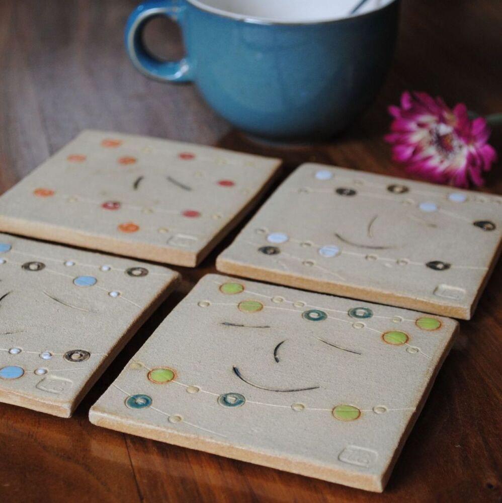 Coasters "Smiley face multicoloured dots" set of four