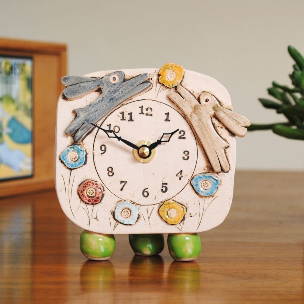 Ceramic clock pebble feet "Rabbit,  hare and flowers"