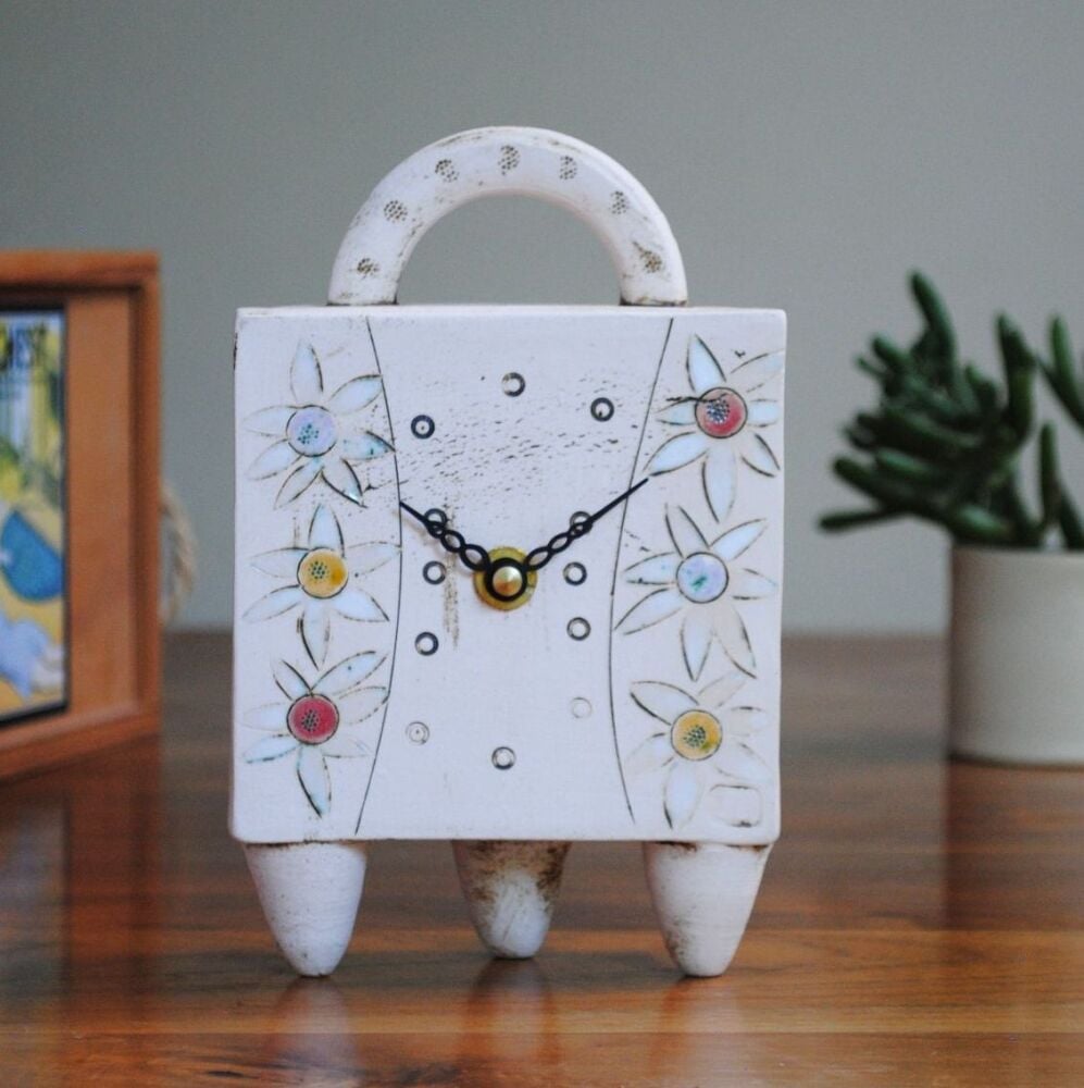 Ceramic mantel clock with feet & handl.