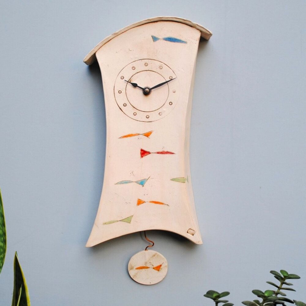 Ceramic wall clock with pendulum "Fish Shoal"