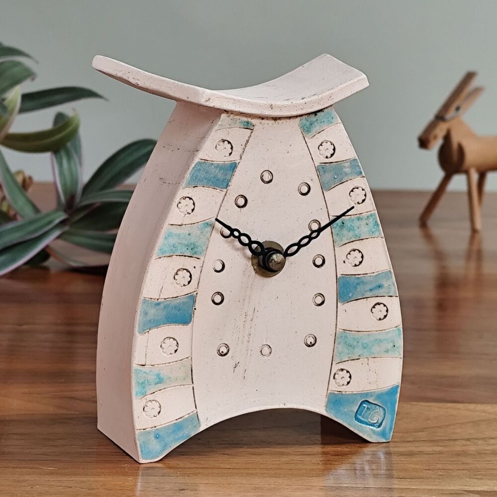 Handmade ceramic mantel clock in blues. 