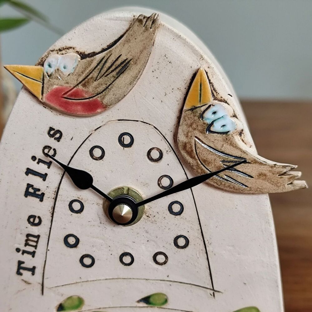 Ceramic mantel clock  small rounded "Robin and brown bird"